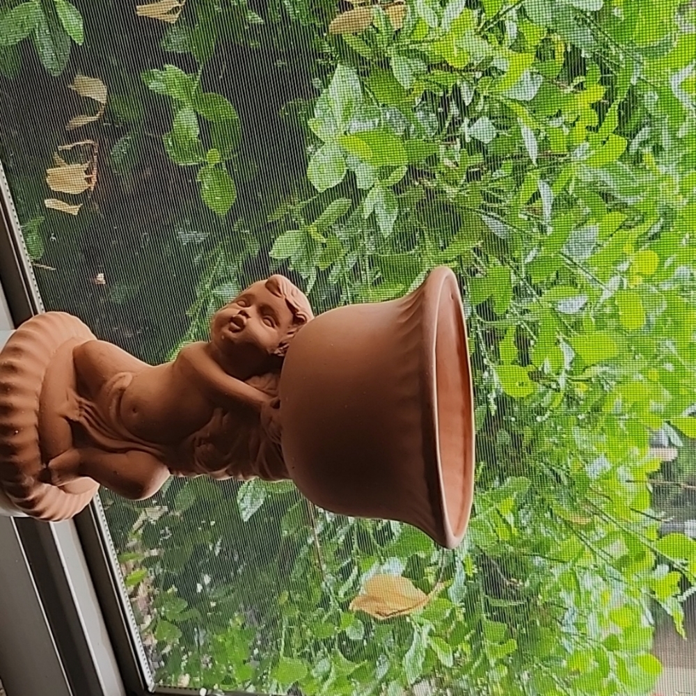 Ceramic cherub planter